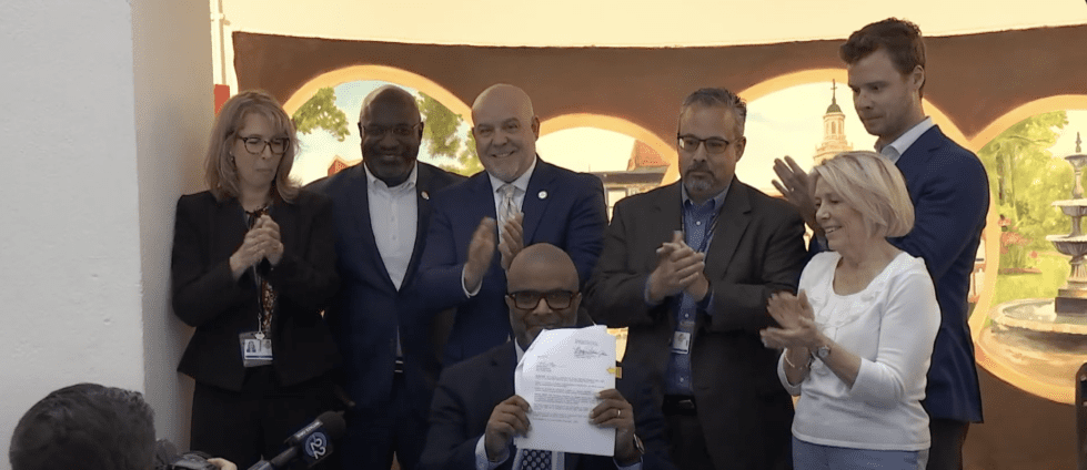New Castle County Executive Marcus Henry signs the Fiscal Year 2026 budget on Thursday, June 12.  (Photo: WITN Channel 22)